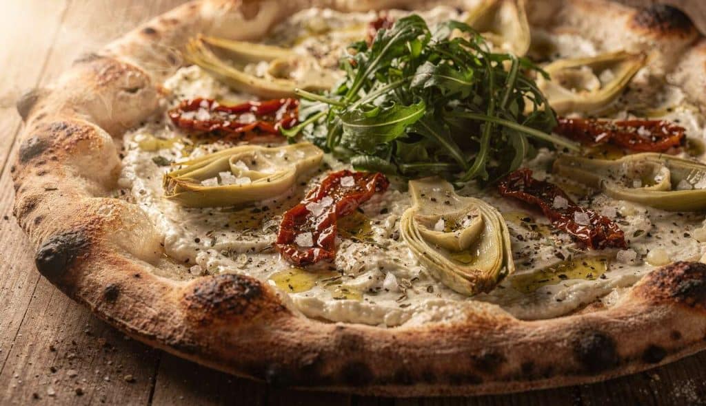 Recette : pizza Bianca à la Roquette et Tartinade Végétale