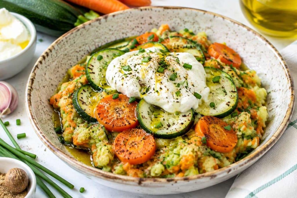 Écrasé de courgettes et carottes au fromage frais